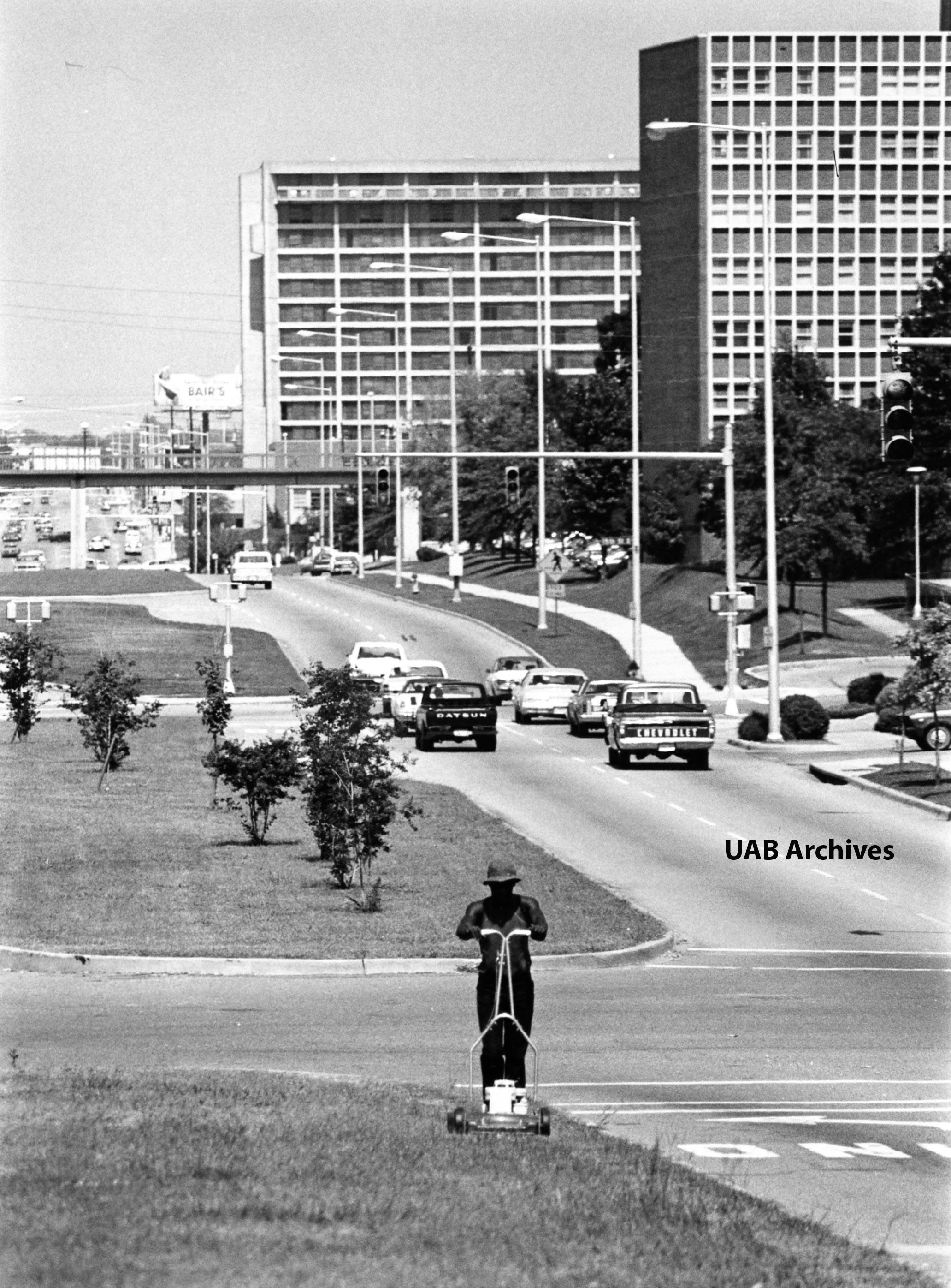 Mowing the median along Eighth Avenue South, 1979