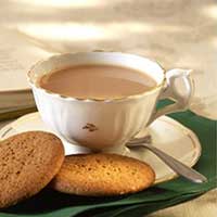 Cup of tea with cookies.