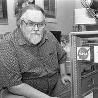 Dr. Thomas Wdowiak with a NASA spectrometer, 1999 