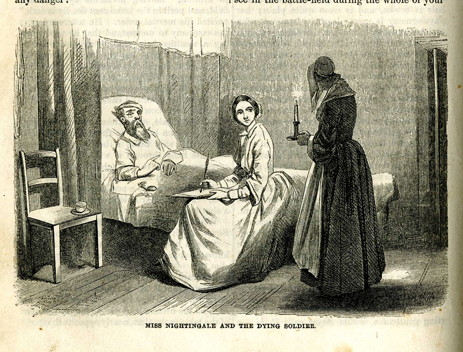 Florence Nightingale sits beside a patient's bed.